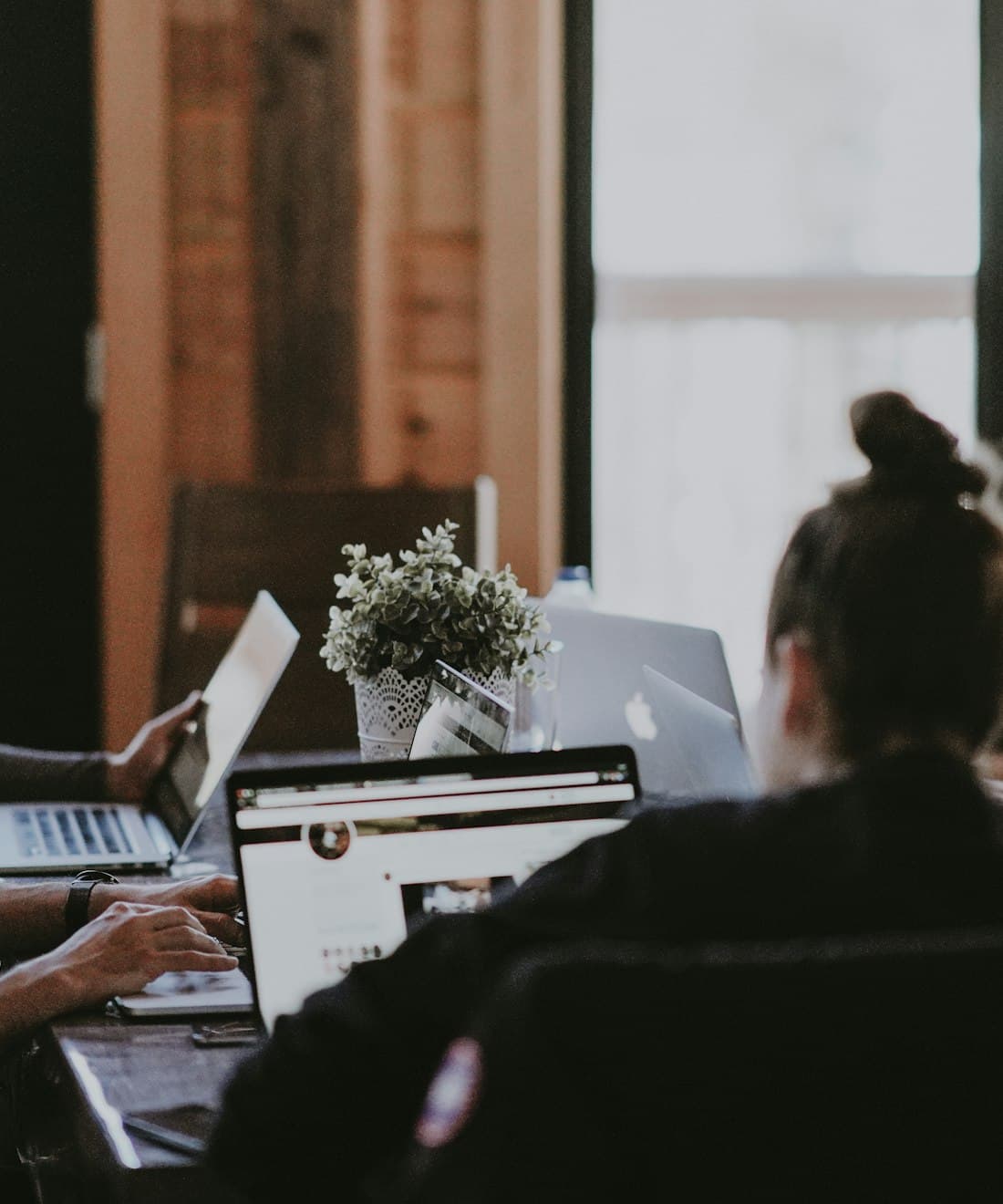 A marketing team reviewing campaign performance around a table